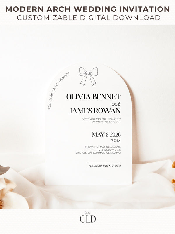 Modern arch wedding invitation template with a minimalist bow design, customizable in Canva. Digital download displayed on soft neutral fabric background, perfect for DIY weddings or professional printing