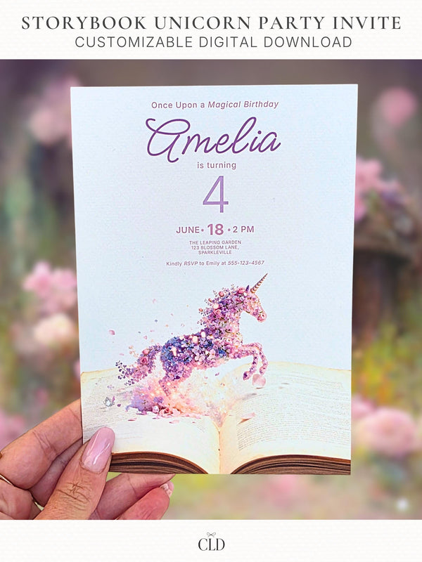 Printable Storybook Unicorn Birthday Invitation shown as a held card featuring a watercolor unicorn made of flowers leaping from an open storybook, editable Canva template for a girl's magical unicorn or princess birthday party.