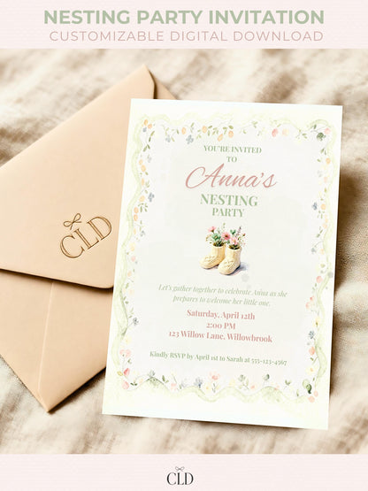 Editable nesting party invitation template featuring watercolor baby booties filled with soft florals and a delicate scalloped floral border. Neutral pastel green and blush tones. Perfect for baby shower or motherhood celebration
