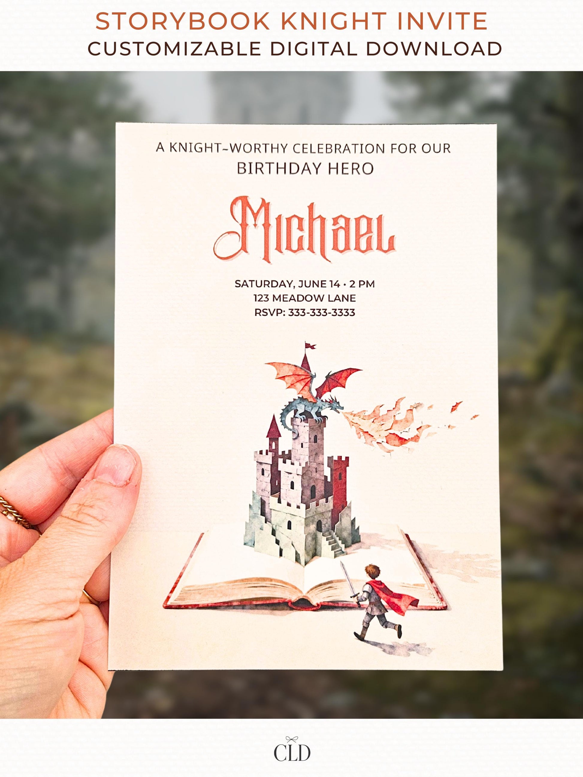 A birthday invitation featuring a medieval storybook with a single rising grey stone castle tower, a dragon clinging to the top breathing stylised paper fire, with a small knight figure facing away and running toward the book. Warm, minimal, fantasy birthday invitation overlay design.