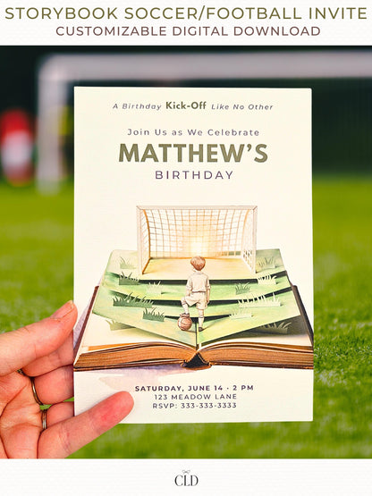 Printable storybook soccer birthday invitation featuring a watercolor pop-up book with a boy standing on layered green pages, a football at his feet, and a glowing goal ahead, held in hand on a soccer field background.