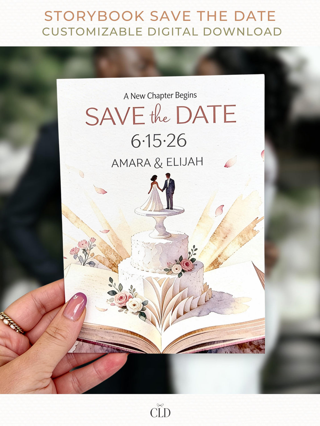 Printable storybook save the date wedding invitation featuring a bride and groom cake topper on a wedding cake emerging from an open book with watercolor flowers and golden light.