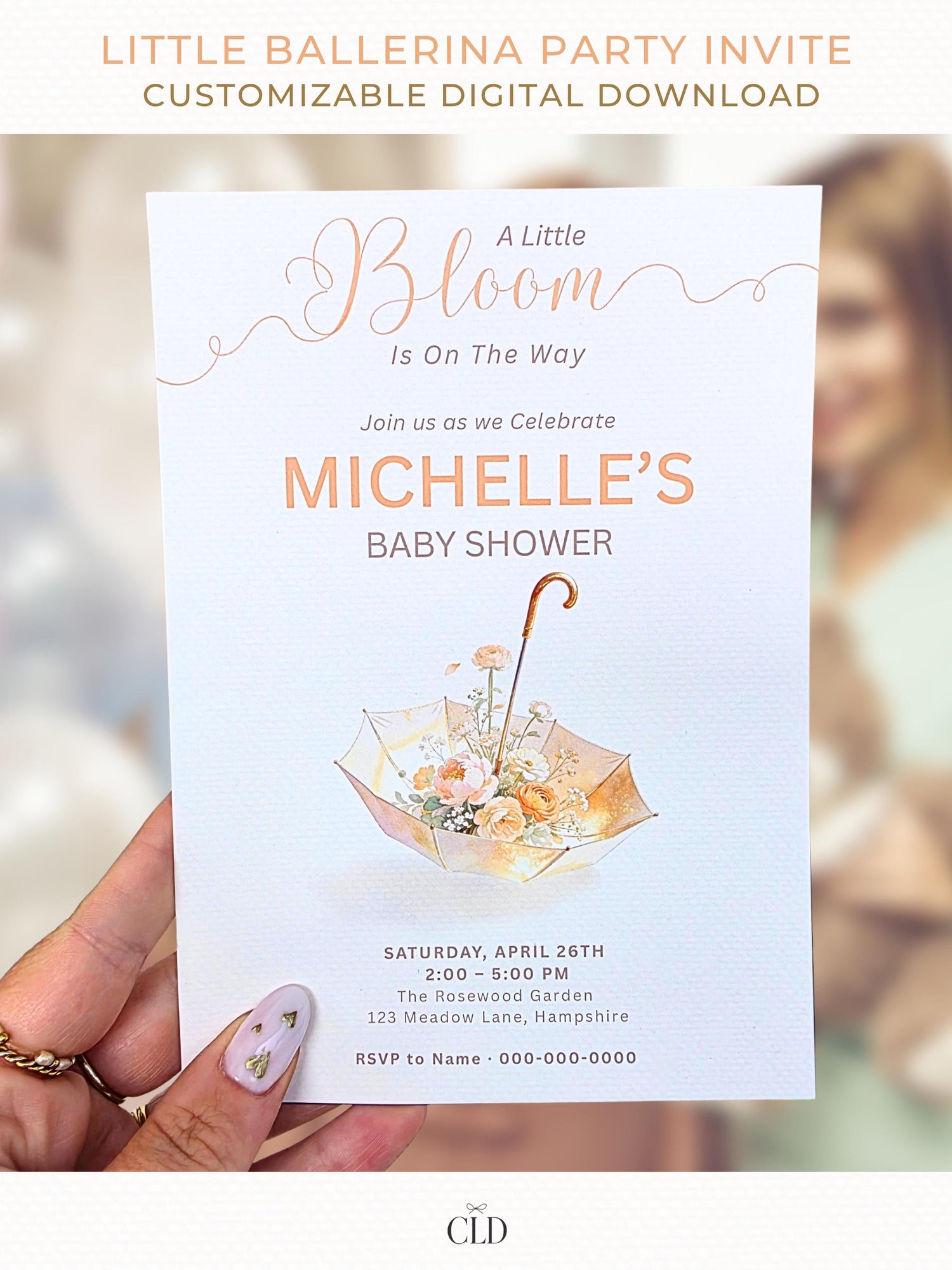 Elegant printable baby shower invitation featuring a floral umbrella design with soft neutral tones and blooming flowers, editable Canva 5x7 template