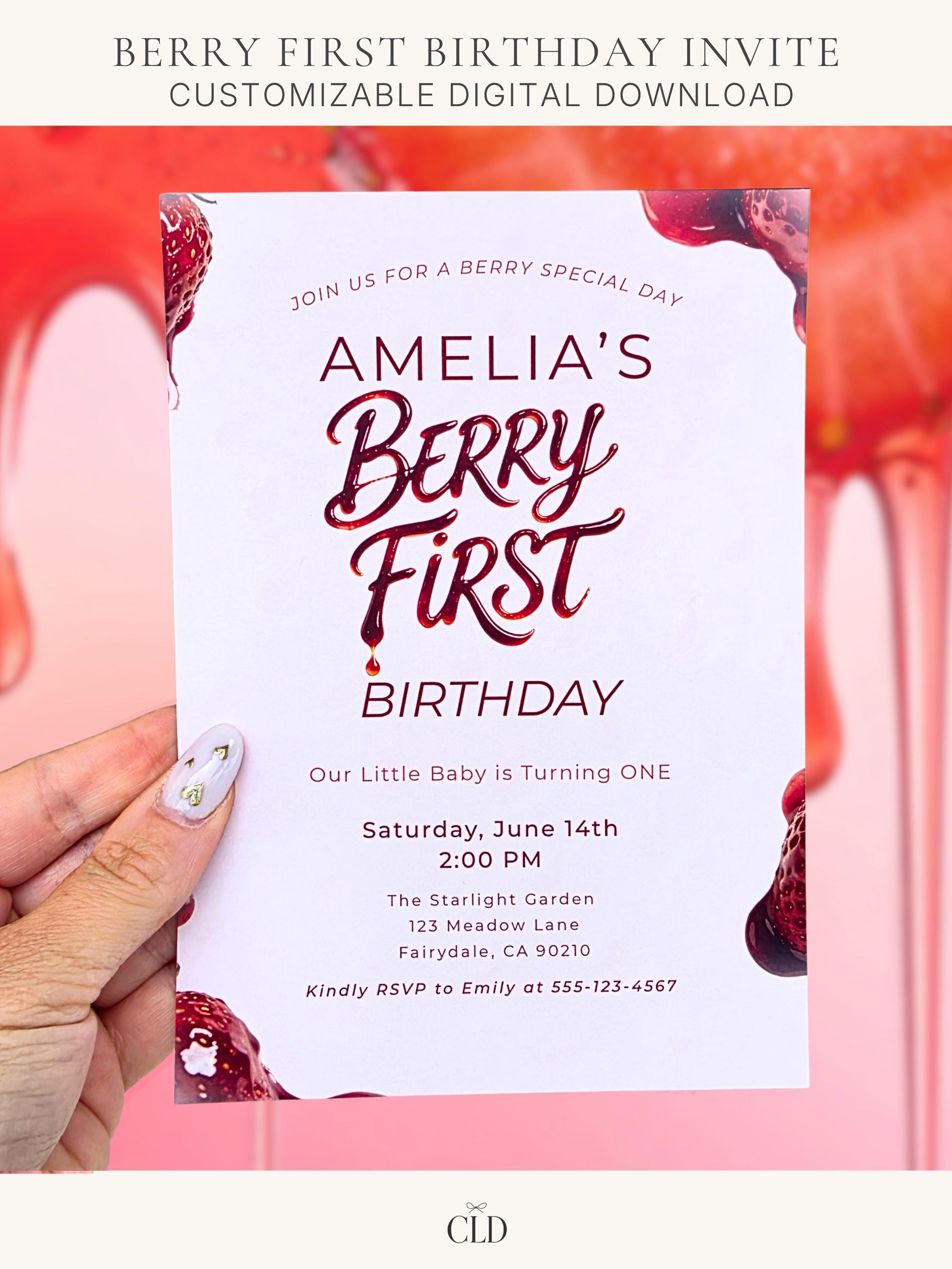 Printable Berry First birthday invitation featuring glossy red strawberry-style lettering, held in hand against a soft pink background, modern editable Canva strawberry first birthday invite